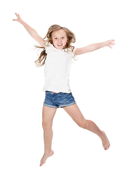 istock Little girl jumping 464602188