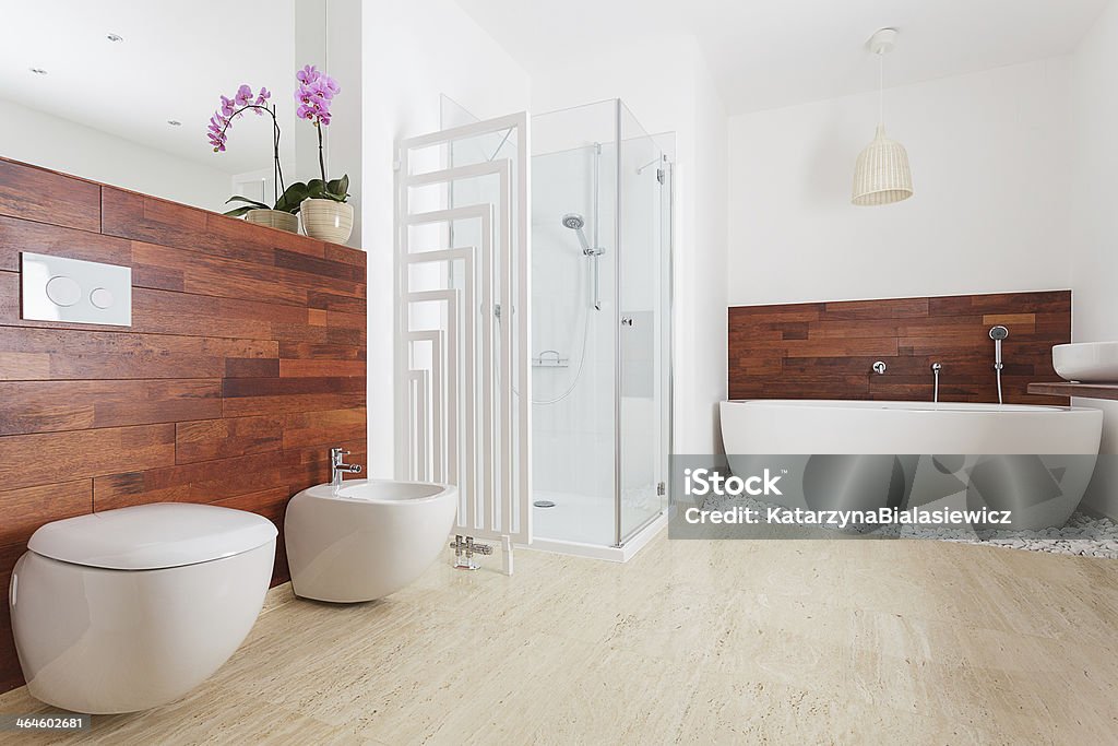 Spacious bright bathroom Spacious bright bathroom with shower and bath Bathroom Stock Photo