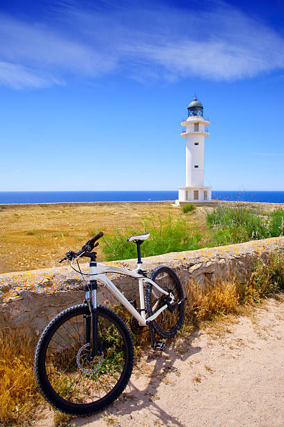 istock bicycle on Balearic Formentera Barbaria Lighthouse 464604878
