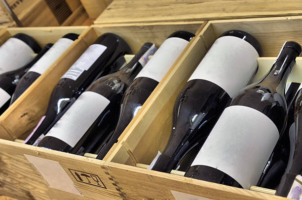 istock Red and white wine bottles in their shipping boxes 464605296