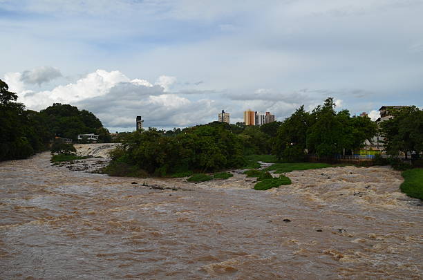 istock Piracicaba river rapids and in the background the city 464605680
