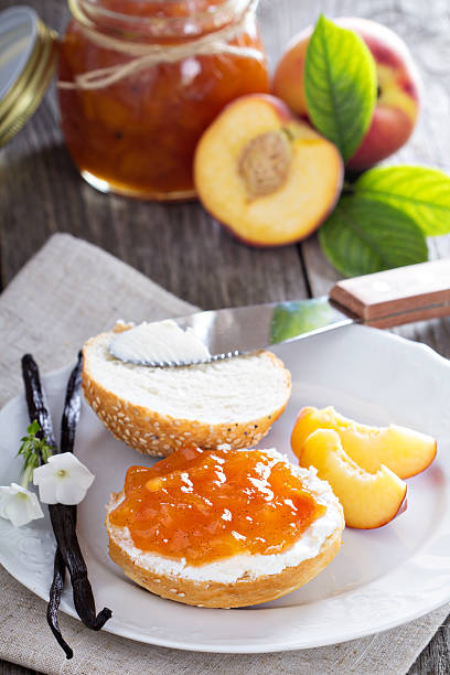 istock Bread with cream cheese and peach jam 464608344