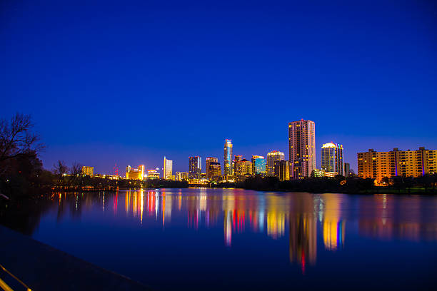 istock Austin at Night from Far Town Lake Reflection 464613602