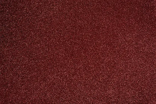 Photo of Shiny background or texture marsala color