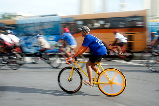 Bangkok,Thailand-September 22,2013 : Cyclist took part in Car Free Day event at RajchadamnoenKlang road near Democracy Monument on September 22, 2013 in Bangkok capital of Thailand.