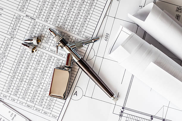 istock Aerograph with the nozzles and drawings on the table 464614044