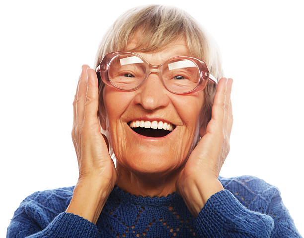 istock Happy surprised senior woman looking at camera 464616352