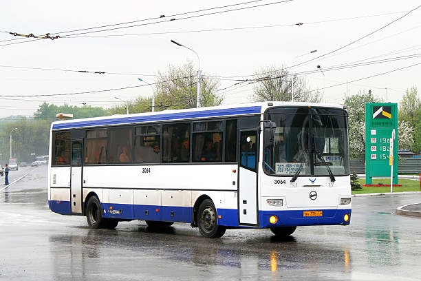 Ufa, Russia - May 15, 2009: White and blue GOLAZ-LIAZ 5256 interurban coach drives at the city street.