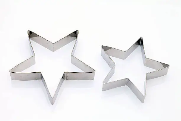 Star shaped cookie cutter on white background