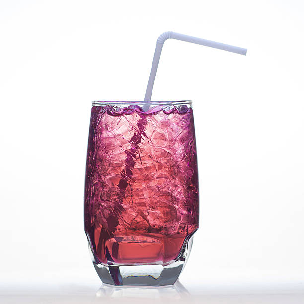 istock Grape flavor soft drinks whit soda water isolated 464621610
