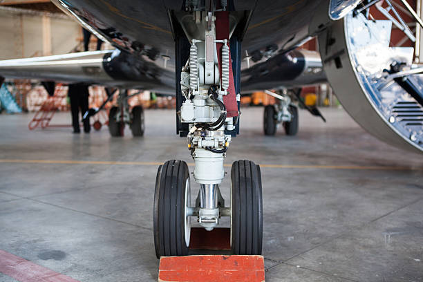 istock Business jet airplane stays in hangar.. 464622932