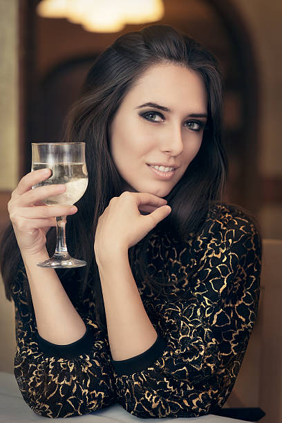 istock Beautiful Elegant  Woman Holding a Drink 464623254