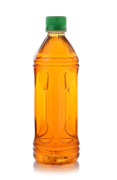 istock bottle of ice tea on white background 464623382