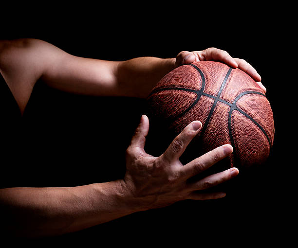 istock Basketball ball in the hands 464626914