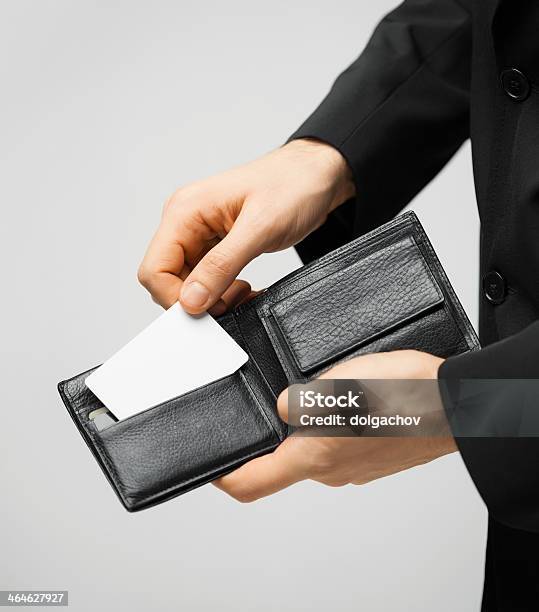 Close Up Of Man Holding Wallet With Credit Card Stock Photo - Download Image Now - Wallet, Greeting Card, Playing Card