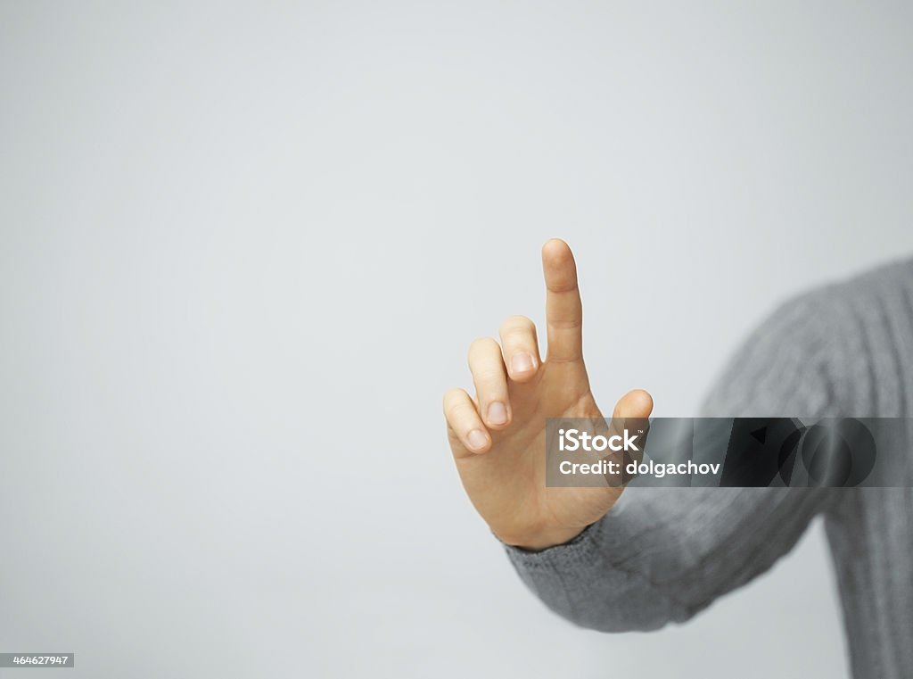 man pressing imaginary button bright picture of man pressing imaginary button Touching Stock Photo