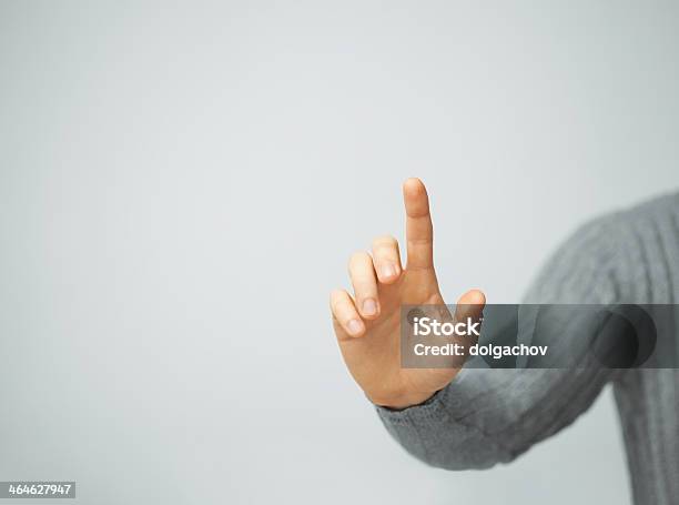 Man Pressing Imaginary Button Stock Photo - Download Image Now - Touching, Pushing, Button - Sewing Item