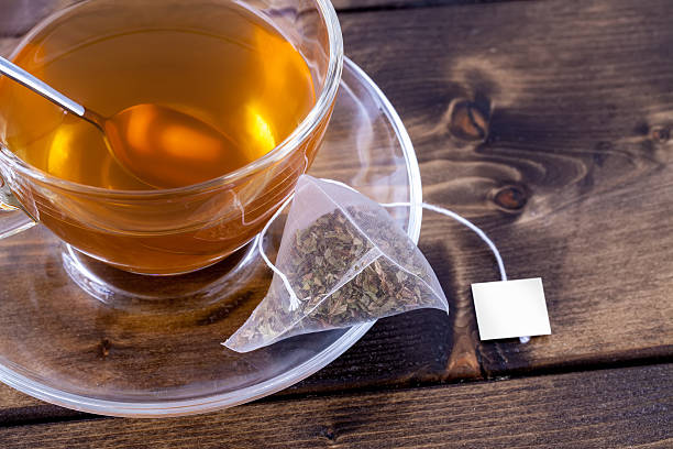 Green tea in glass teacup stock photo