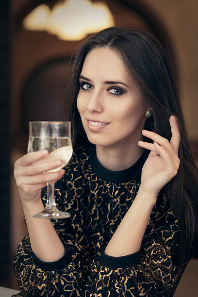 istock Beautiful Elegant  Woman Holding a Drink 464628346