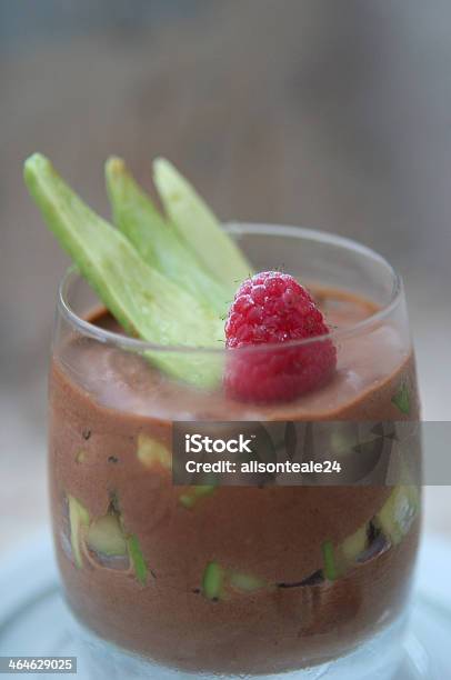 Chocolate Avocado Mousse With A Raspberry Garnish Stock Photo - Download Image Now - Avocado, Chocolate, Mousse - Dessert