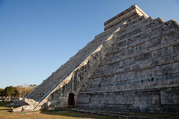 Spring Equinox at Chichen Itza Kukulcan Temple The feathered serpent god of the Mayans, crawls down the pyramid El Castillo during spring equinox. kukulkan pyramid photos stock pictures, royalty-free photos & images