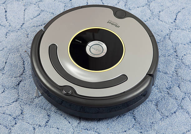 iRobot Roomba Vacuum Cleaning Robot stock photo