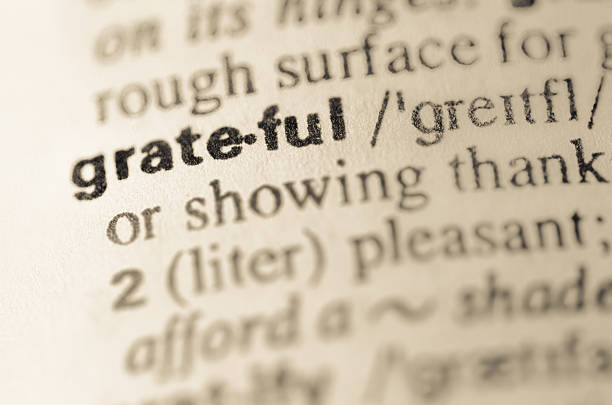Dictionary definition of word grateful stock photo