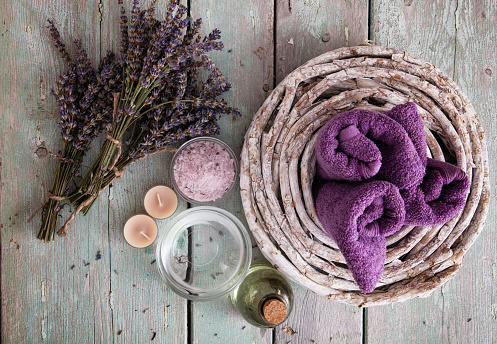 Spa and wellness setting with lavender flowers; floral water and bath salt. Dayspa nature set;