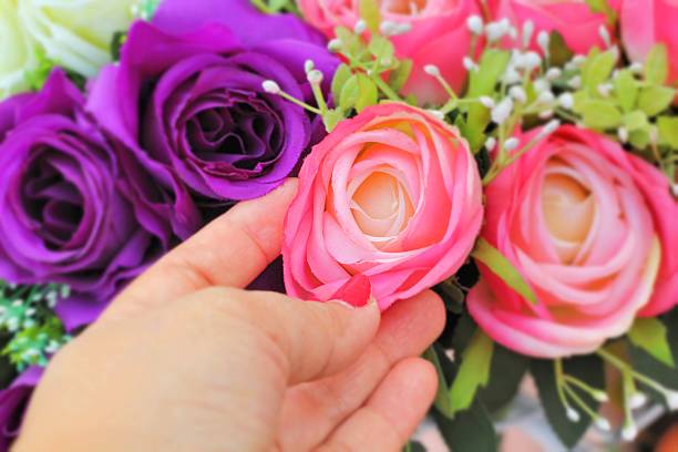 istock beautiful of rose artificial flowers 464632510