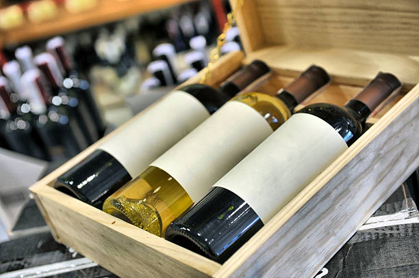 istock Red and white wine bottles in box 464635978