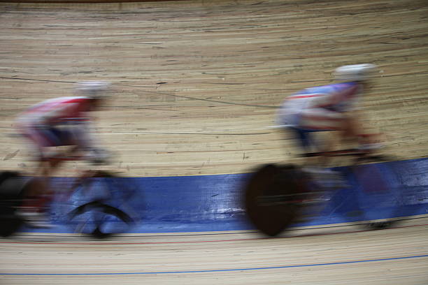 Bicycle Race Velodrome Velodrome  competition speed blurred motion velodrome stock pictures, royalty-free photos & images