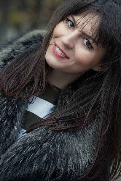 istock Young attractive woman wearing fur 464641287