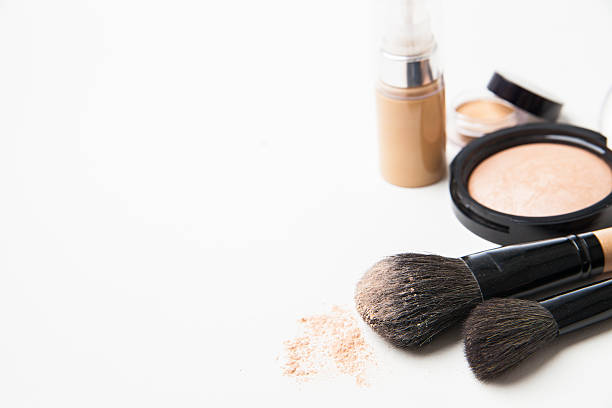 istock Powder, foundation and brushes on the white background 464643952