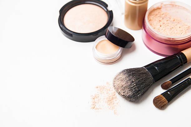 istock Powder, foundation and brushes on the white background 464643962