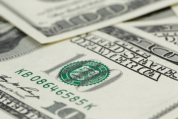 istock lots of one hundred dollar banknotes, background 464645674