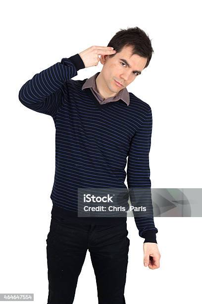 Handsome Man Doing Different Expressions In Different Sets Of Clothes Stock Photo - Download Image Now