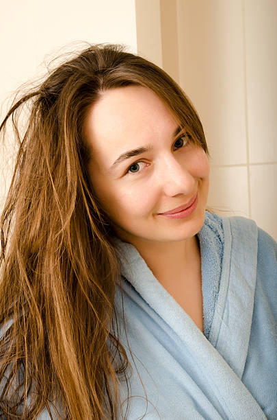 istock woman in bathroom 464647757