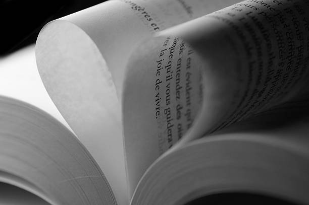 istock White Sheets of a book heart shaped 464650013