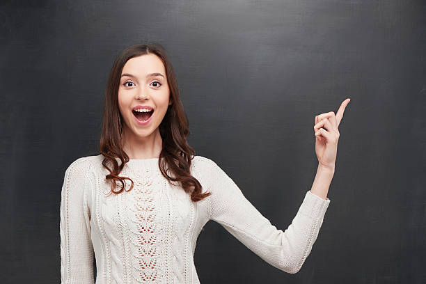 istock Funny surprised woman looking at camera 464650032