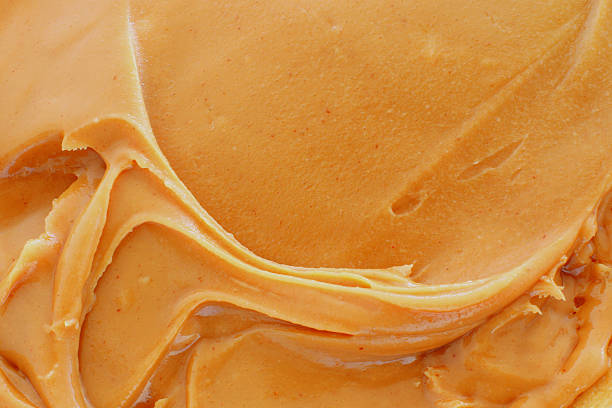istock A closeup of smooth peanut butter 464650190