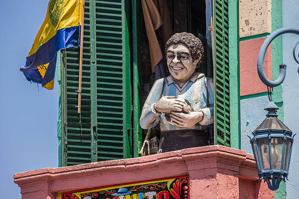 Statue of Diego Maradona in la Boca in Buenos Aires Buenos Aires, Argentina - November 4, 2012: Statue of the famous soccer player Diego Maradona holding a ball. The statue can be seen in La Boca neighbourhood in Buenos Aires, Argentina la boca photos stock pictures, royalty-free photos & images