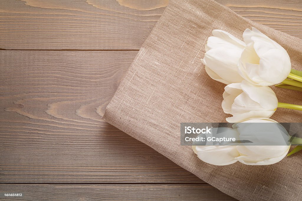 beautiful  white tulips on wooden background with copy space beautiful  white tulips on wooden background with copy space, springtime 2015 Stock Photo