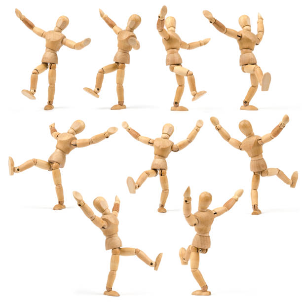 A wooden mannequin that is about to grab a falling one
