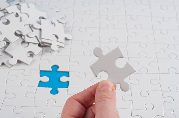 istock finishing the jigsaw - with wich piece? 464663678