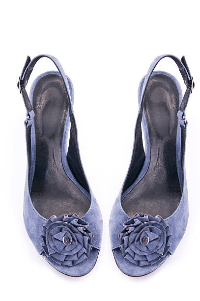 Blue summer shoes on a white background. Isolated.. Blue summer shoes on a white background. Isolated..Studio shot isolated. womens blue suede shoes stock pictures, royalty-free photos & images