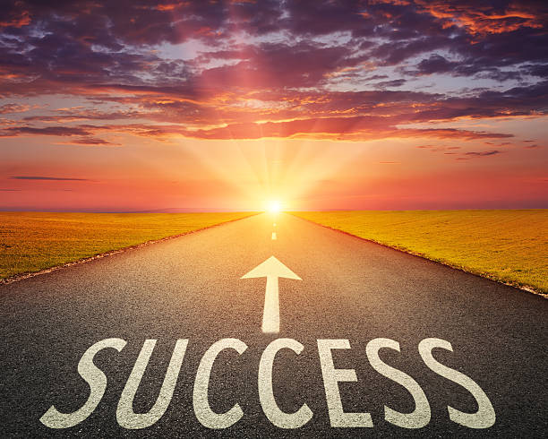 istock Road at sunset and sign which symbolizing success 464668042