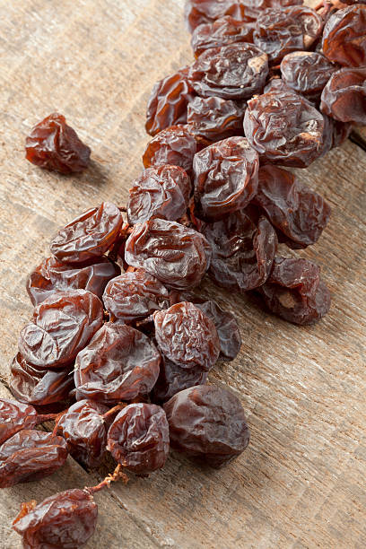 istock Twig of muscat raisins close up 464668366