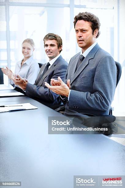 Dan Trunkman Applauds A Successful Meeting Stock Photo - Download Image Now - Photography, Vertical