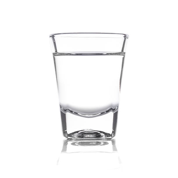 istock vodka and wineglass isolated on white 464673688