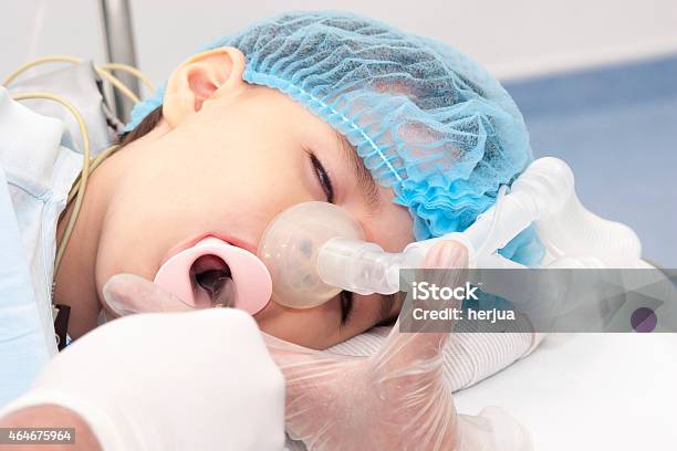Child Patient Receiving Artificial Ventilation Stock Photo - Download Image Now - 2015, Accidents and Disasters, Anesthetic